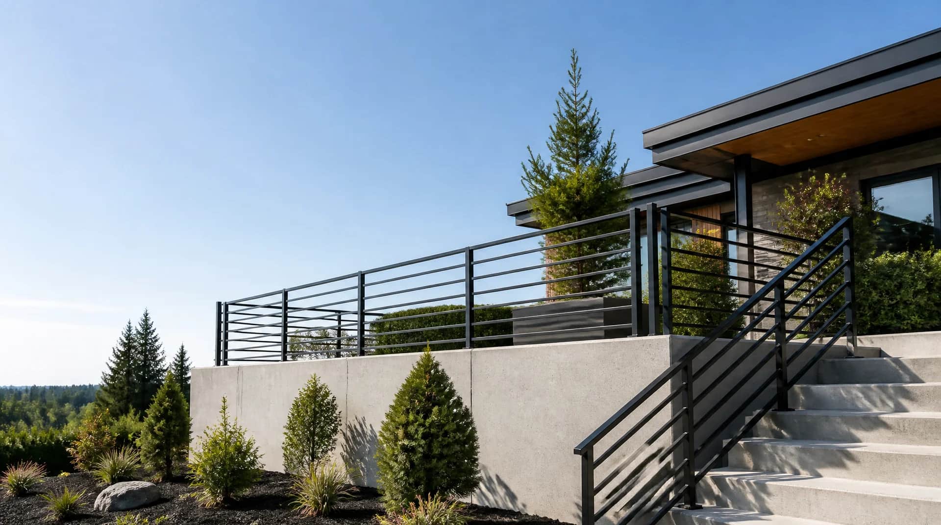 Aluminum deck railing on a modern home exterior